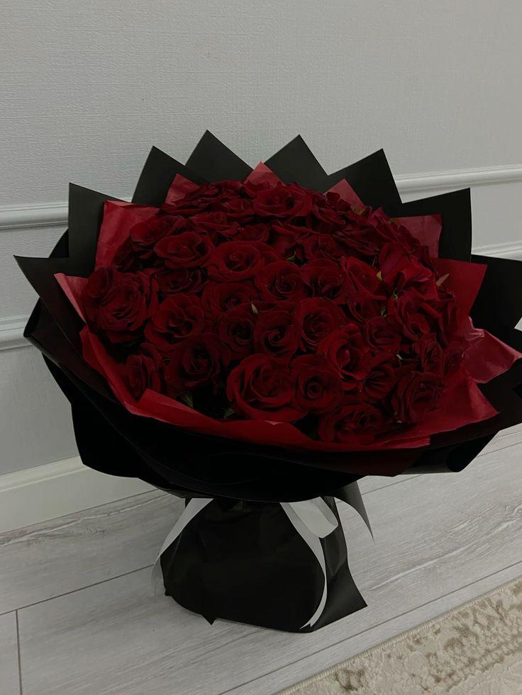 Corporate meeting room with carefully timed floral arrangements that maintain elegance throughout business hours